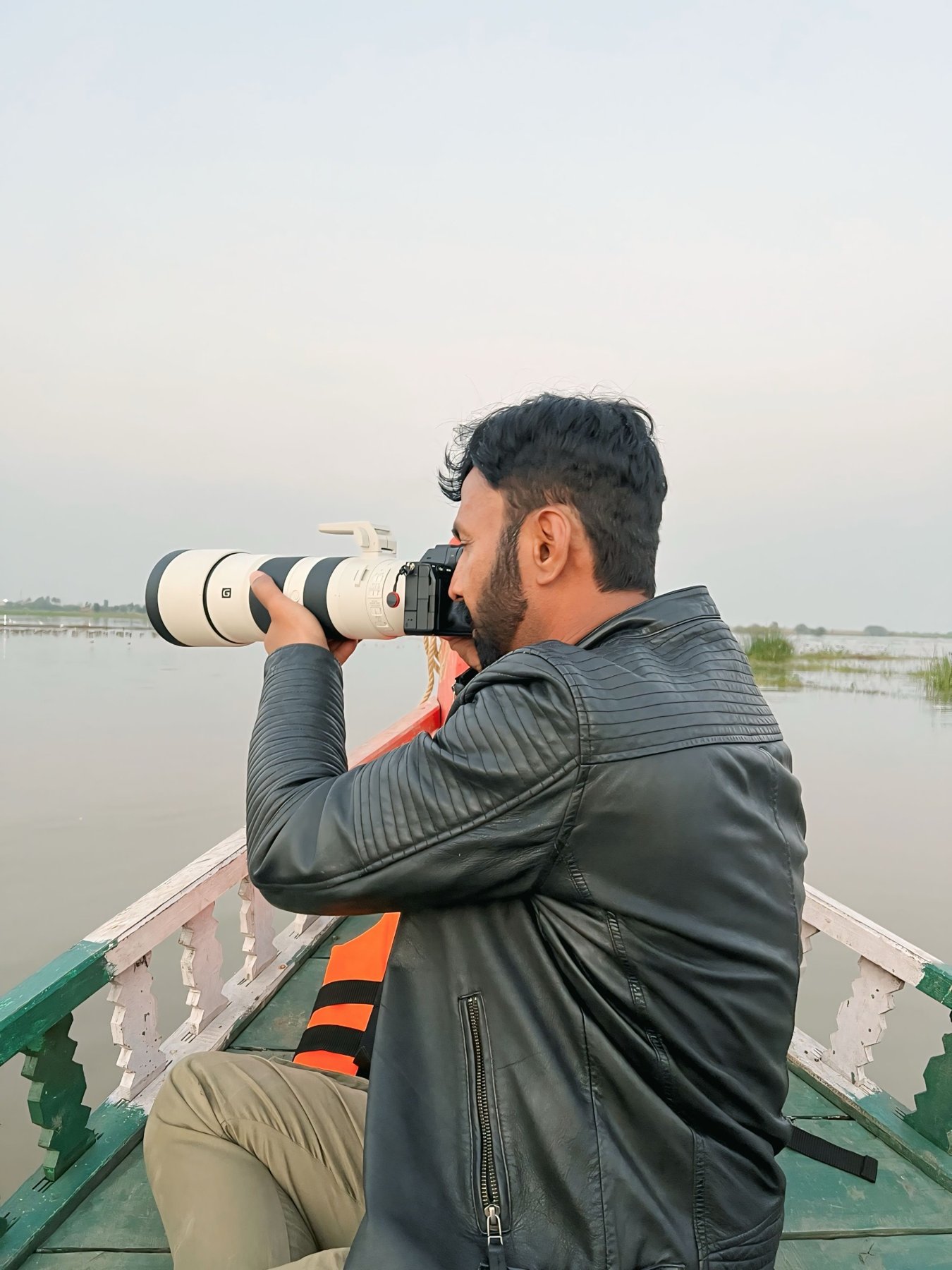 Dr. Vishwanath Bite with Sony 200-600mm on boat — wildlife photography