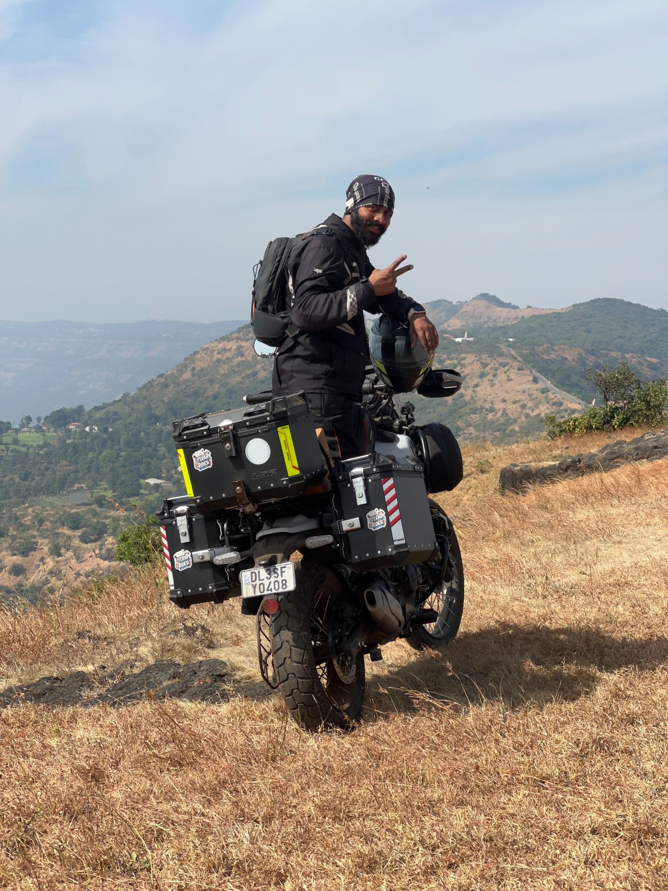 Royal Enfield Classic 350 with flag — fort ruins